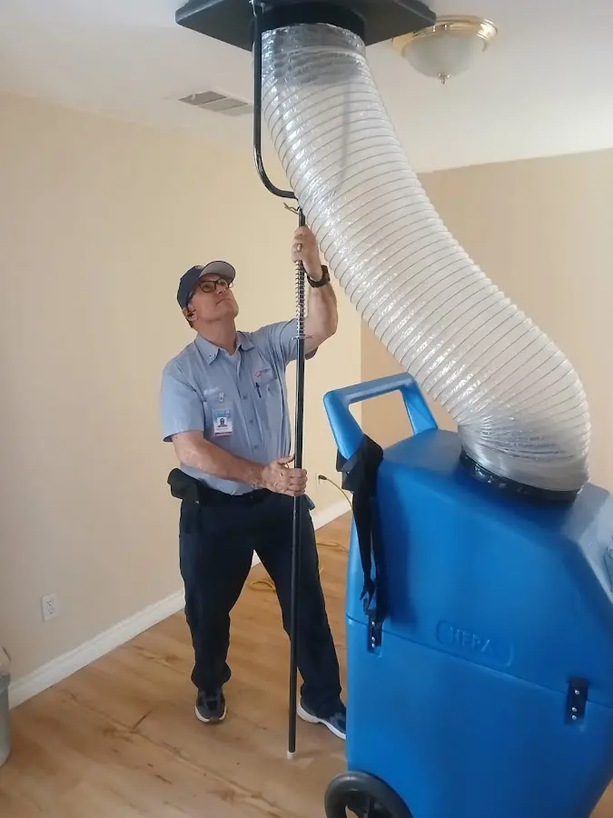 HVAC Installation technician using HEPA equipment in Paxton